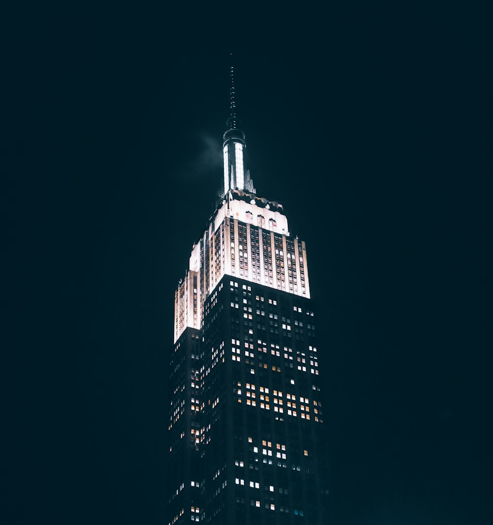 a very tall building lit up at night