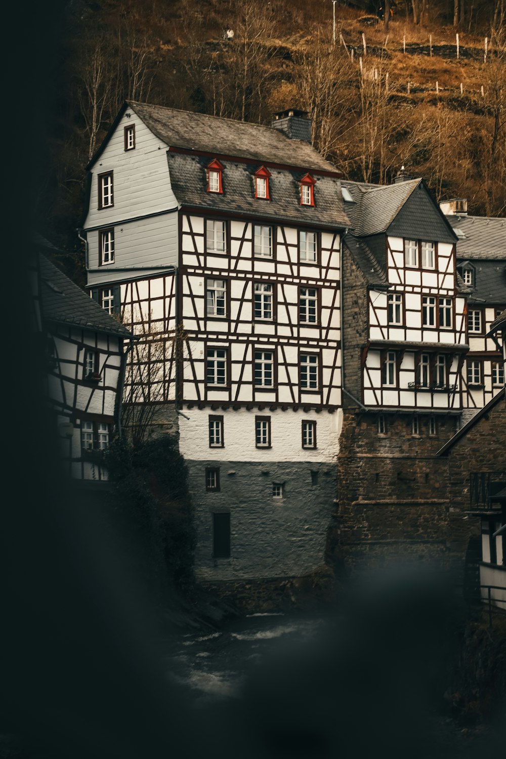 a building next to a body of water