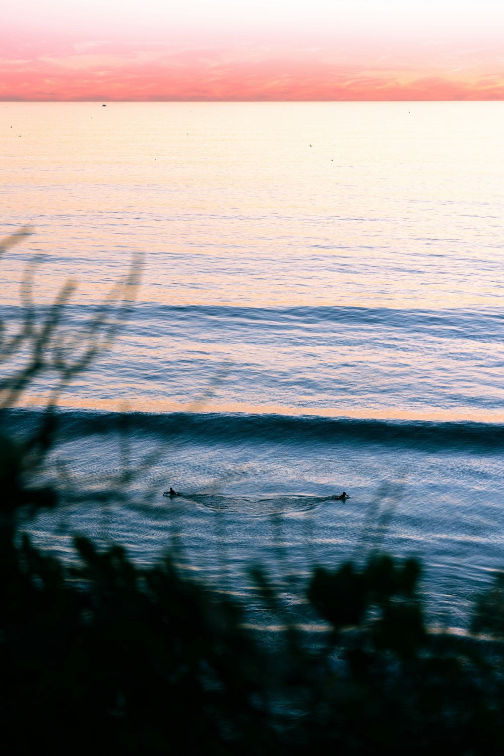 a sunset over a body of water