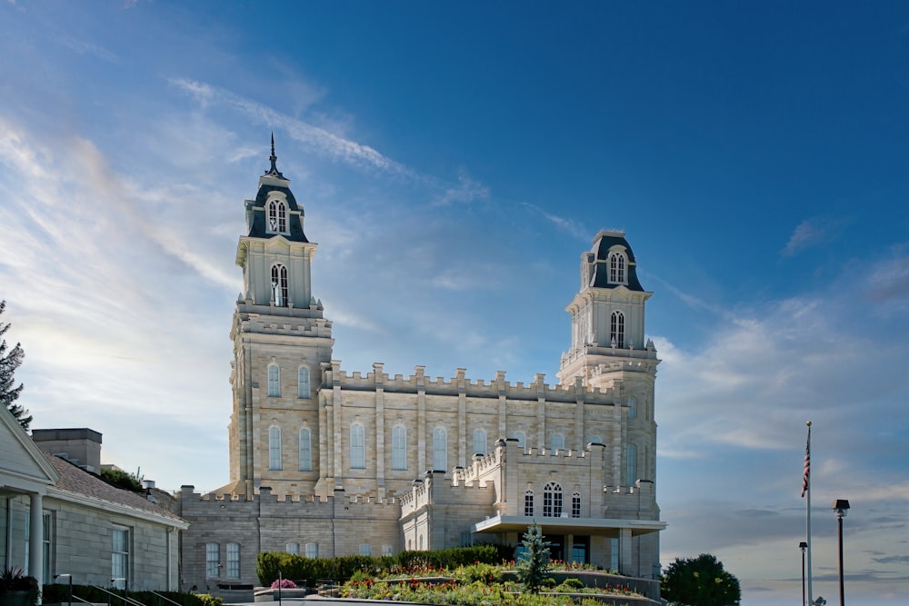 a large building with two towers on top of it