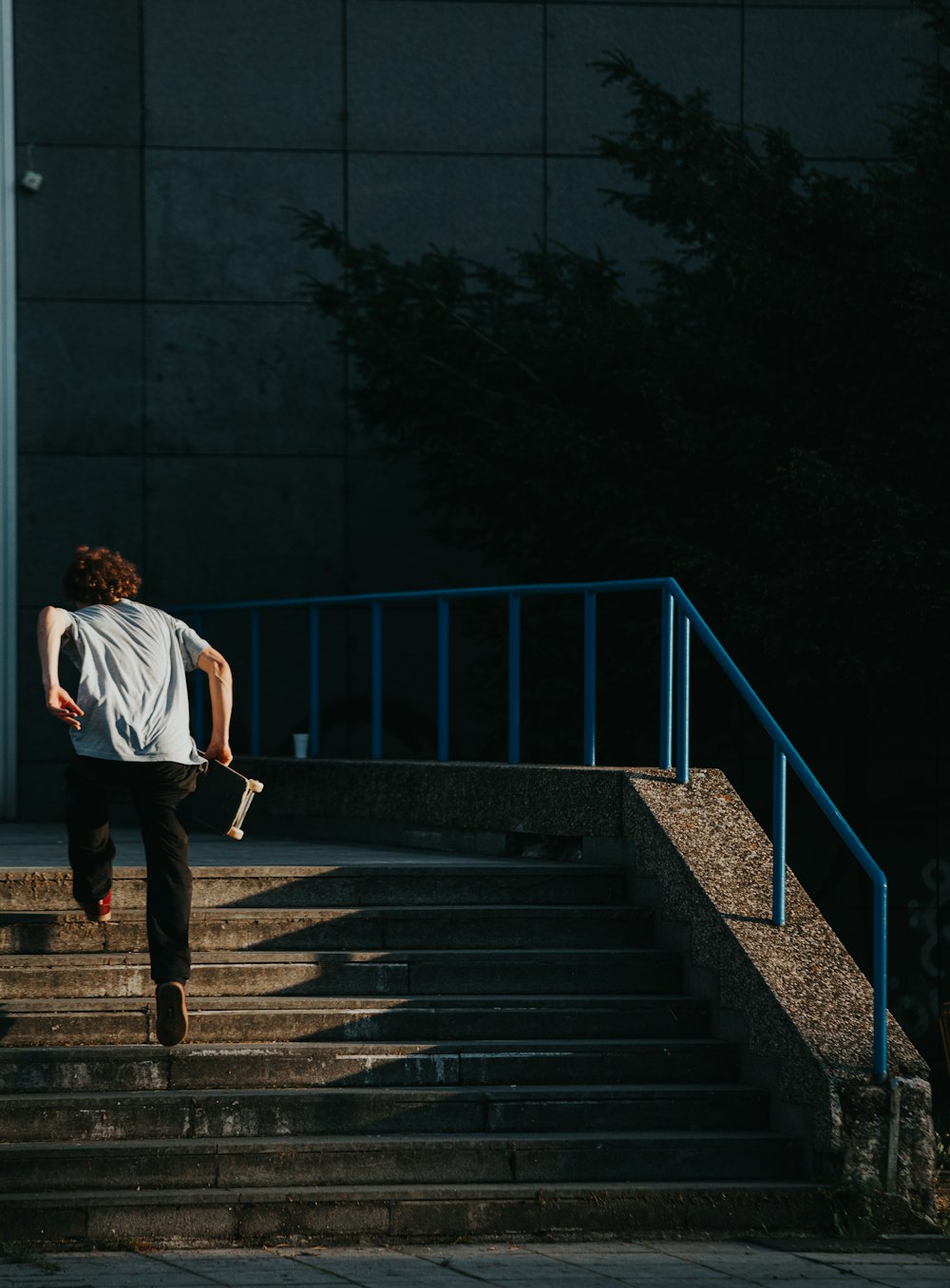 a man is running down some steps