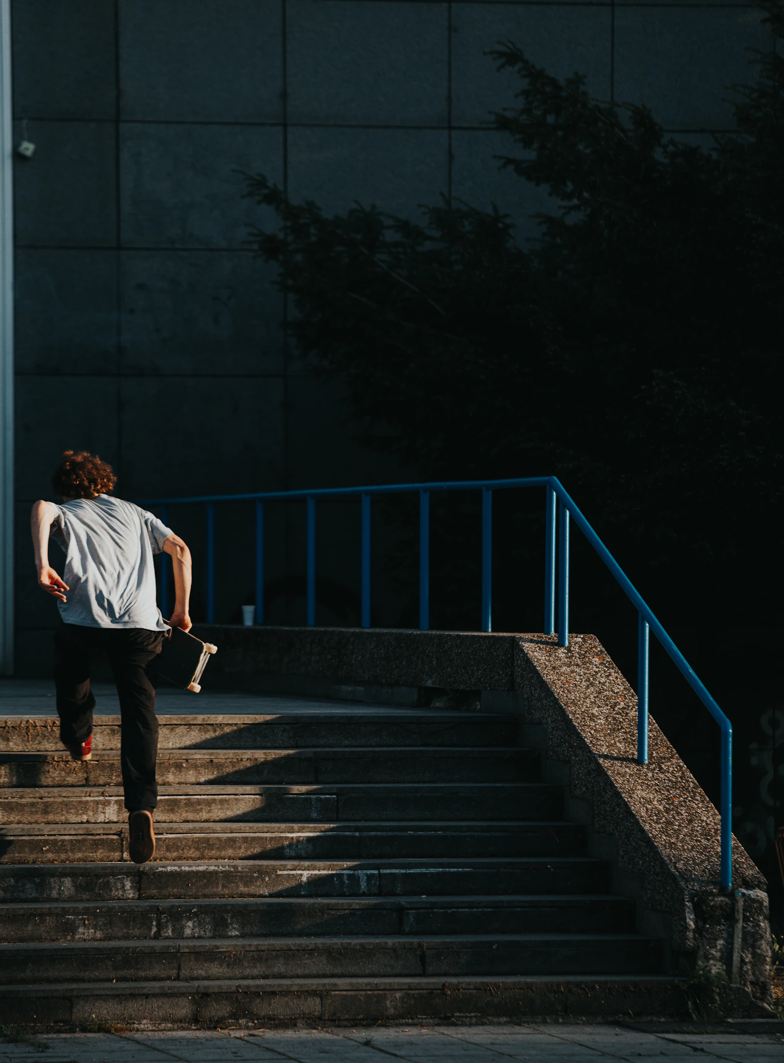 A man running up stone steps