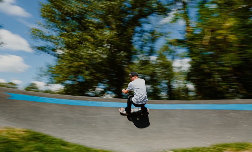 a man riding a skateboard down the side of a ramp