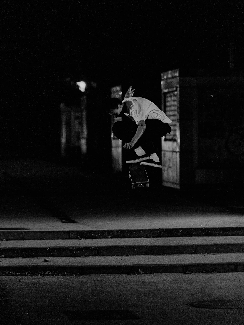 a person jumping a skate board in the air