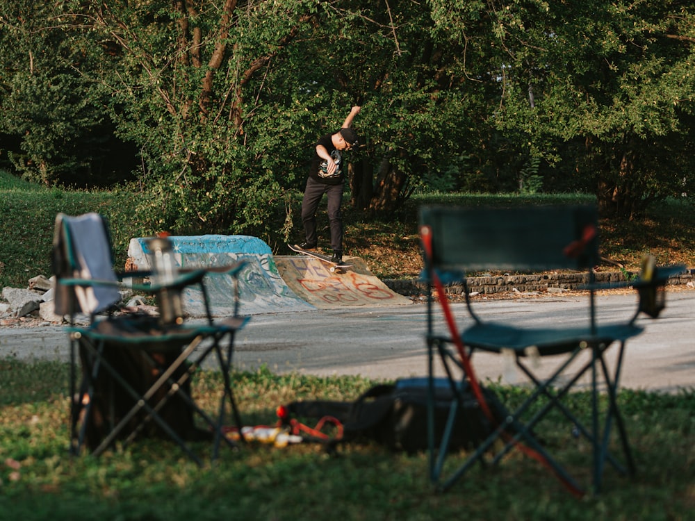 a man riding a skateboard on top of a ramp