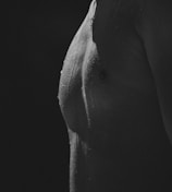 a black and white photo of a woman's breast