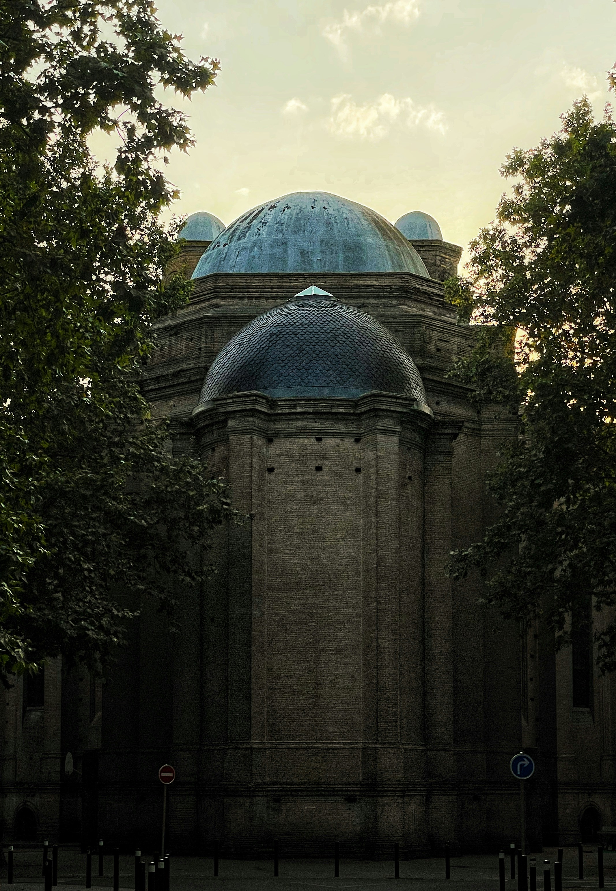 a large building with a blue dome on top of it