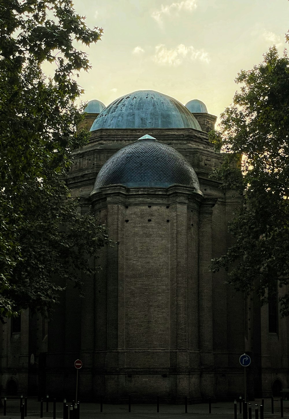 a large building with a blue dome on top of it