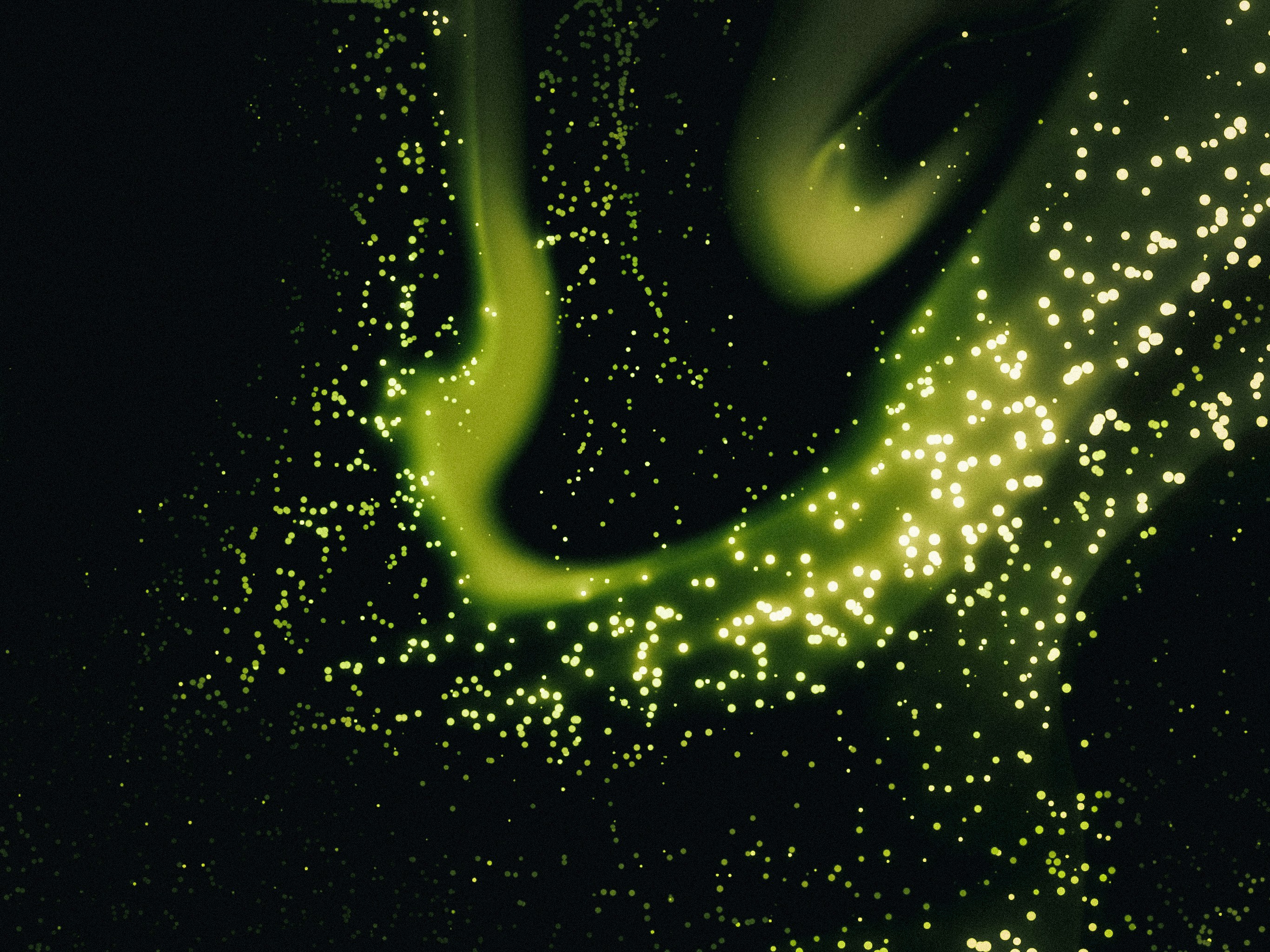 Abstract background of glowing digital particles representing academic data