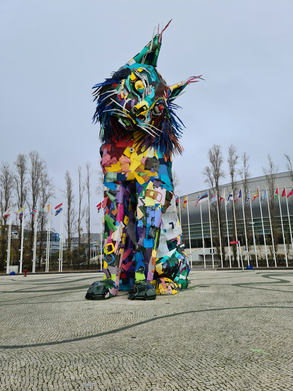 a sculpture of a cat made out of colorful papers