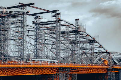 a large metal structure sitting on top of a bridge