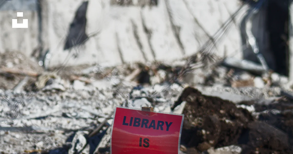 Closure Sign For Library A library is closed sign sitting on top of a bottle photo – Free Road ...