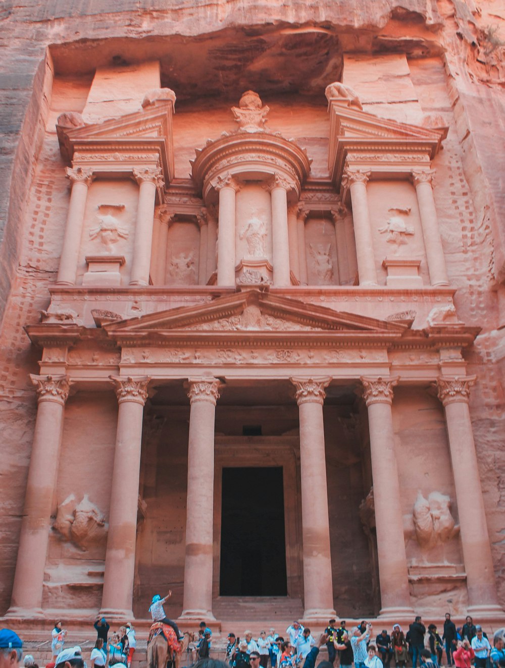 a group of people standing in front of a building