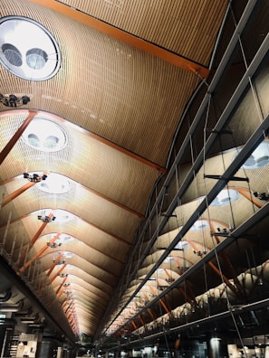 the ceiling of a train station is made of wood