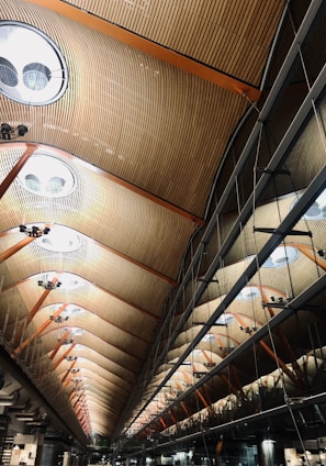 the ceiling of a train station is made of wood