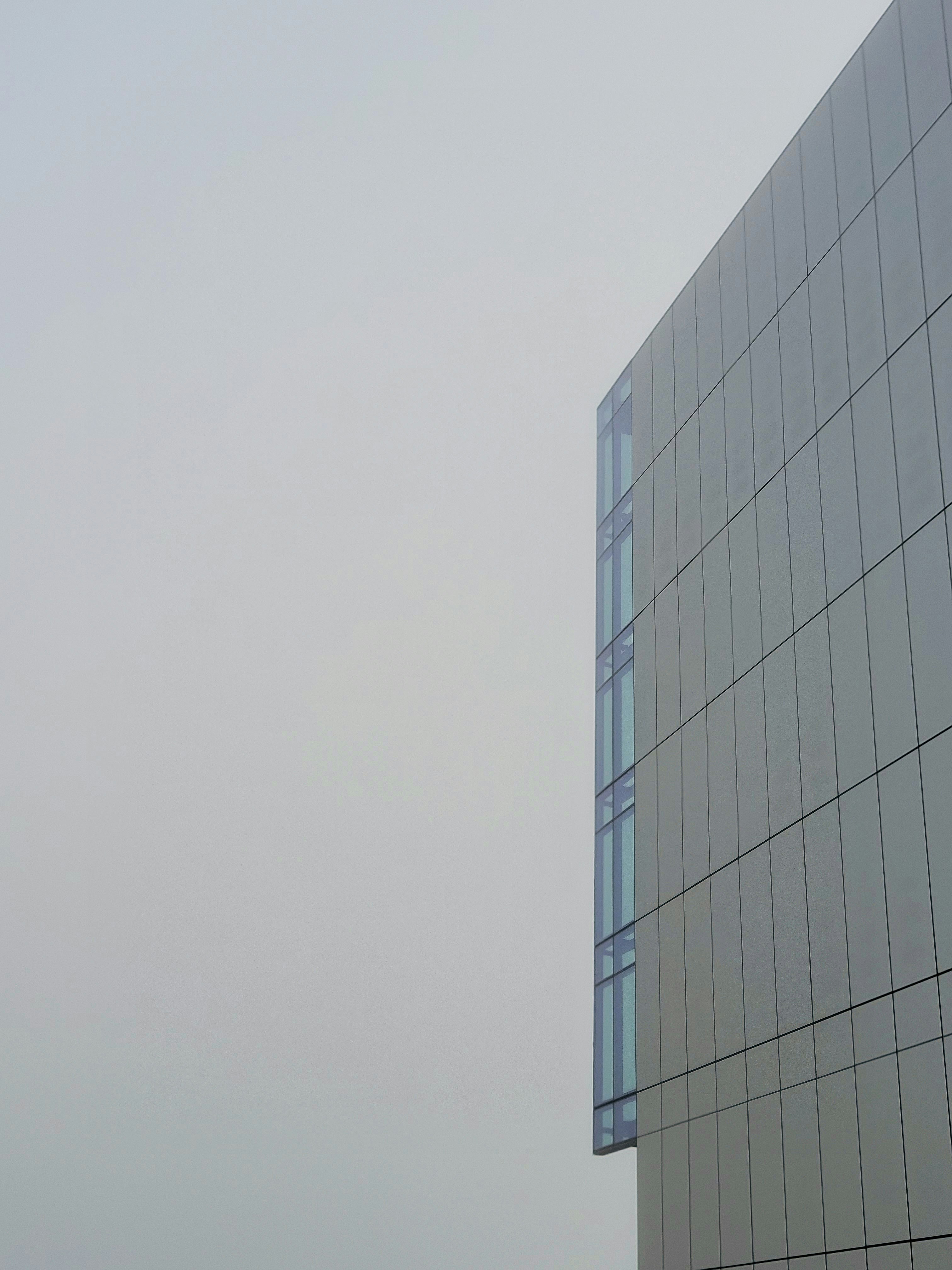 a large building with a clock on the side of it