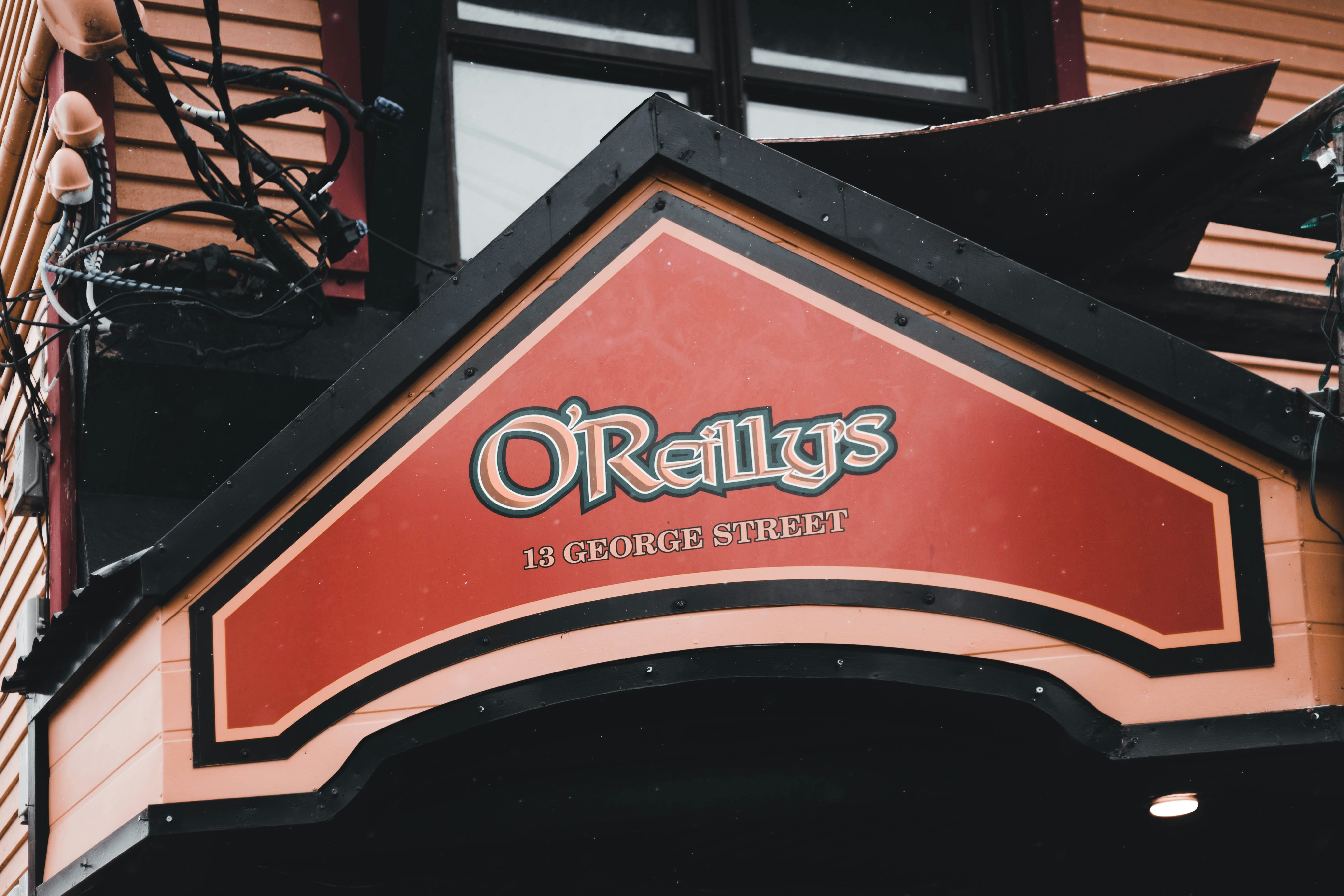 a close up of a sign on the side of a building