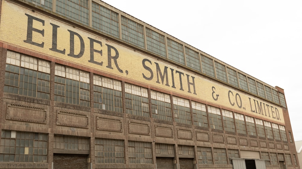 an old building with a sign on the side of it