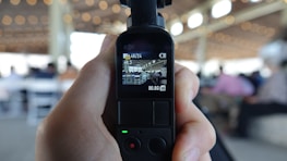 Close-up of a camera capturing candid moments that highlight social responsibility.