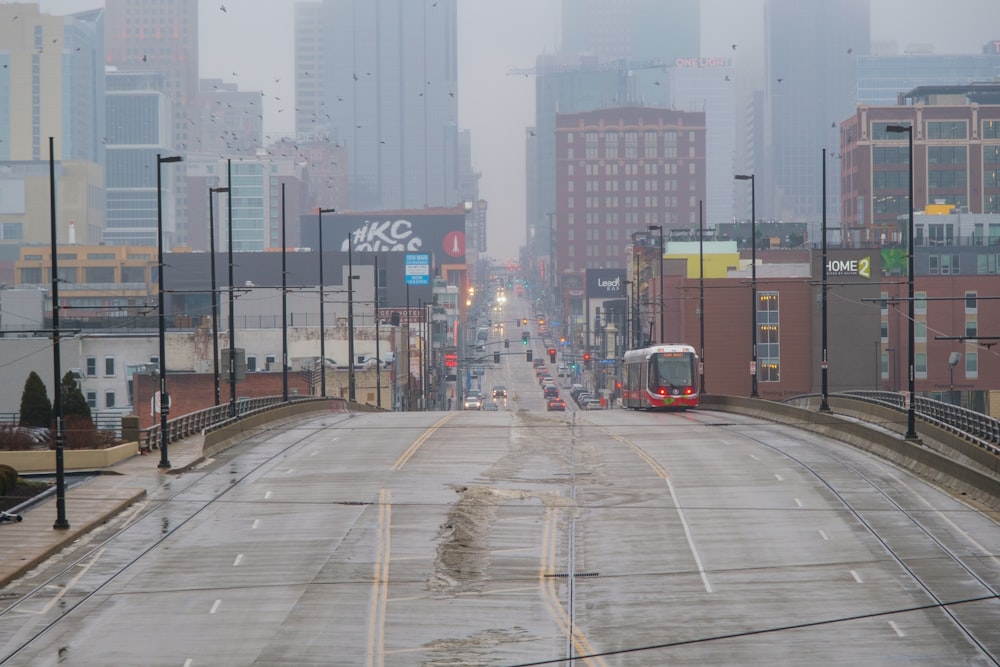 a city street with a bus driving on it