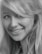 A professional headshot of Sarah K., a happy customer of Towmei.