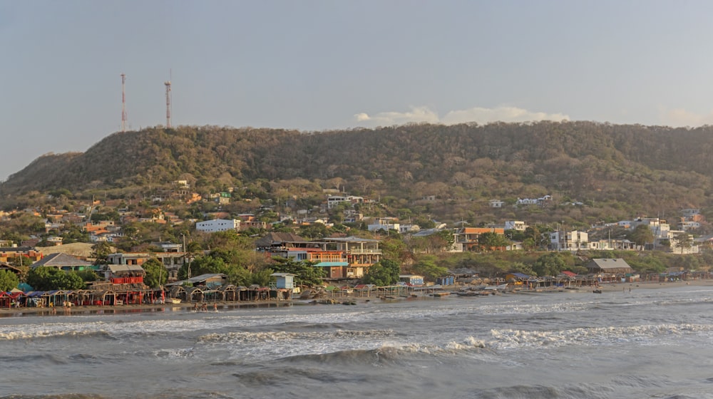 a view of a town from the ocean