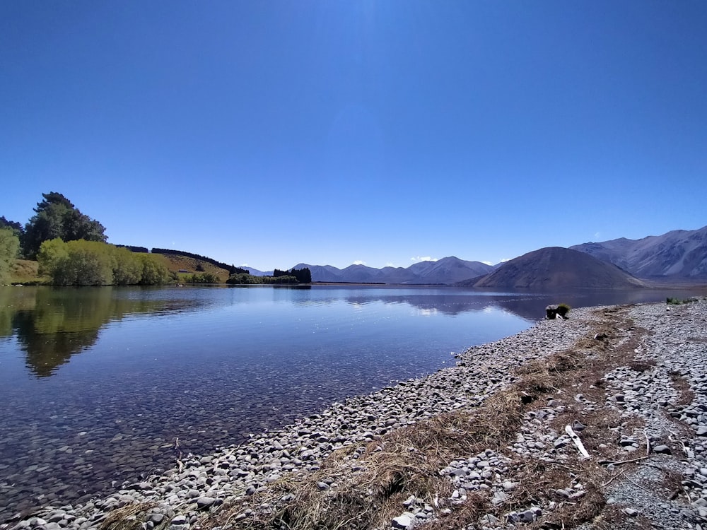 a large body of water surrounded by mountains