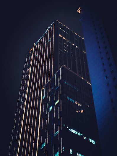 a very tall building lit up at night