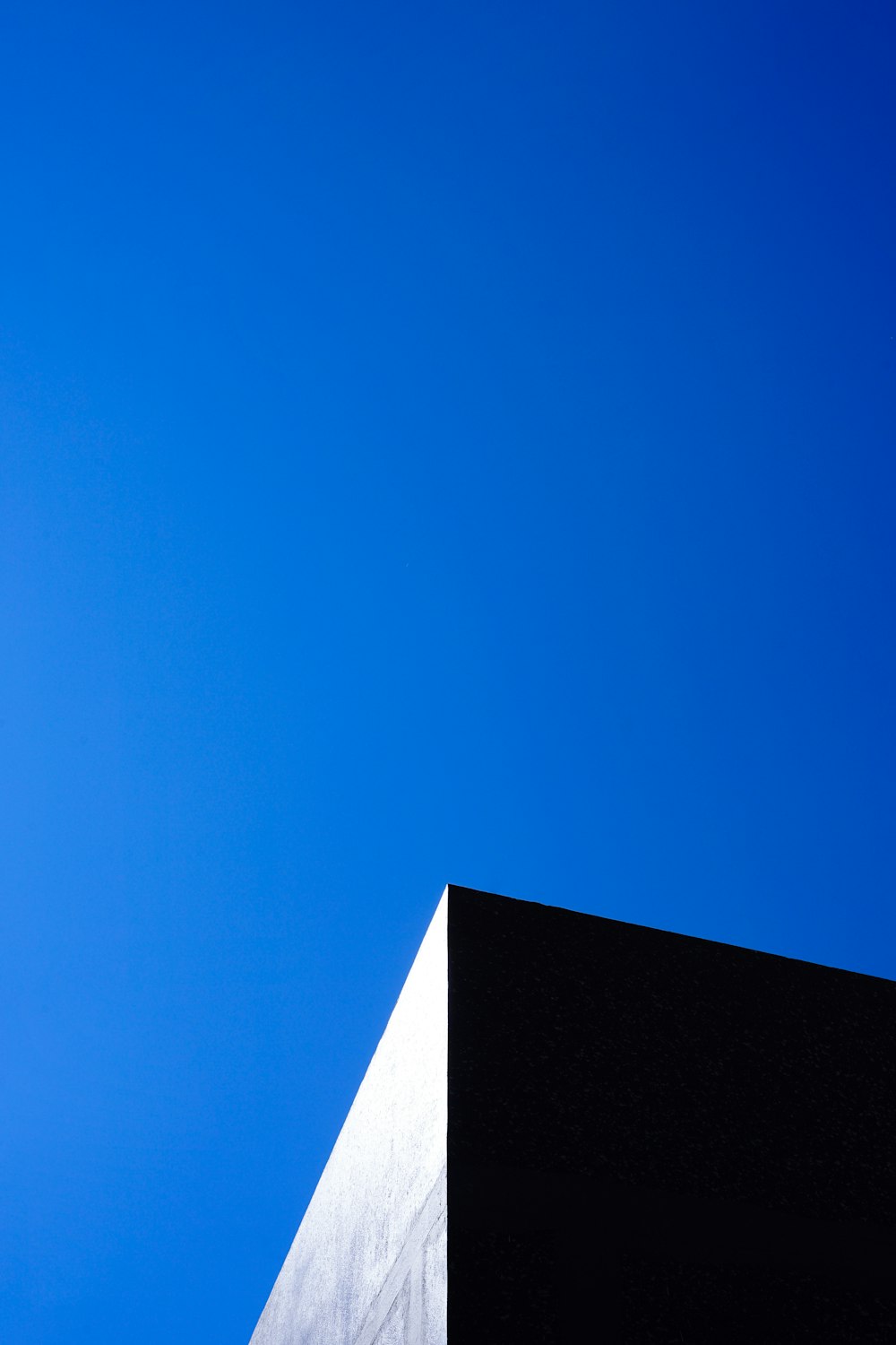 a tall building with a clock on the top of it