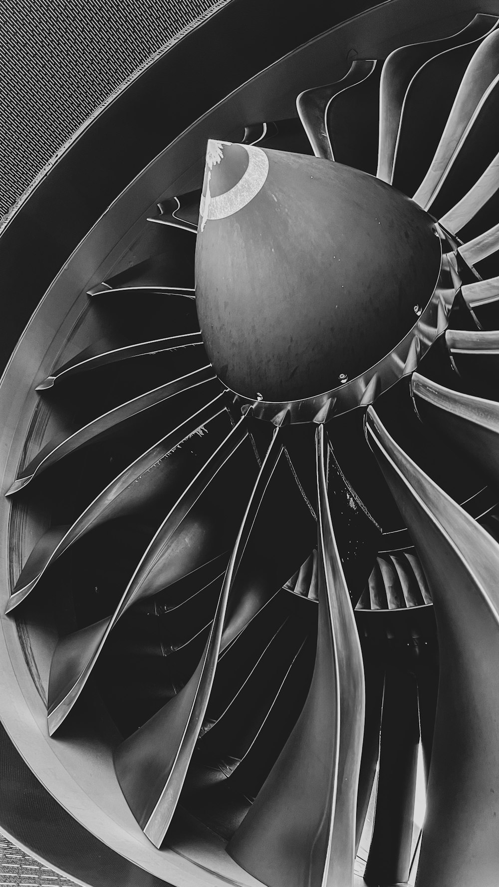 a black and white photo of a turbine