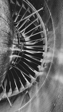 a black and white photo of a turbine