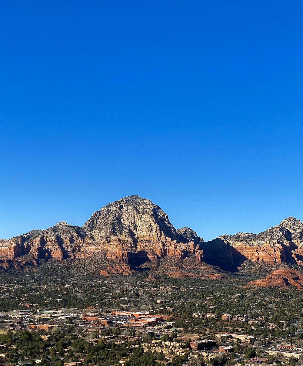 a view of a mountain range with a clear blue sky