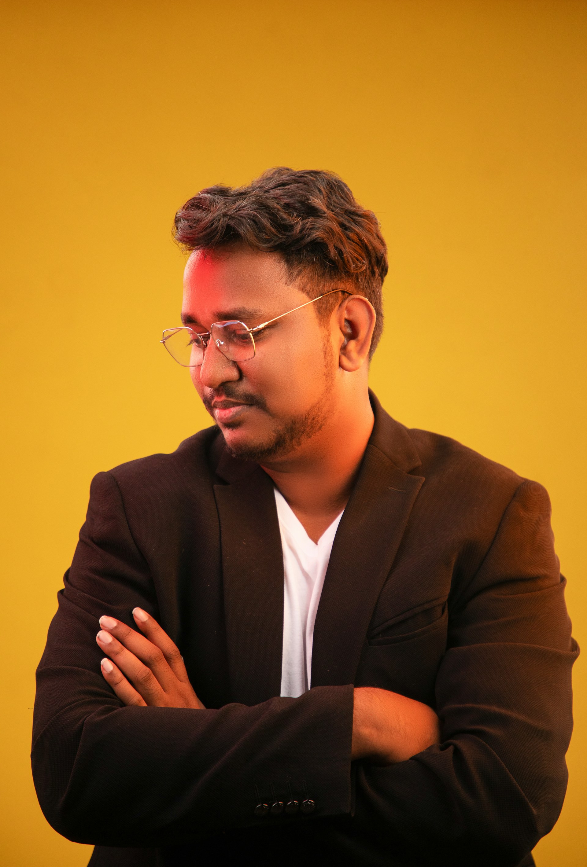 woman wearing yellow long-sleeved dress under white clouds and blue sky during daytime