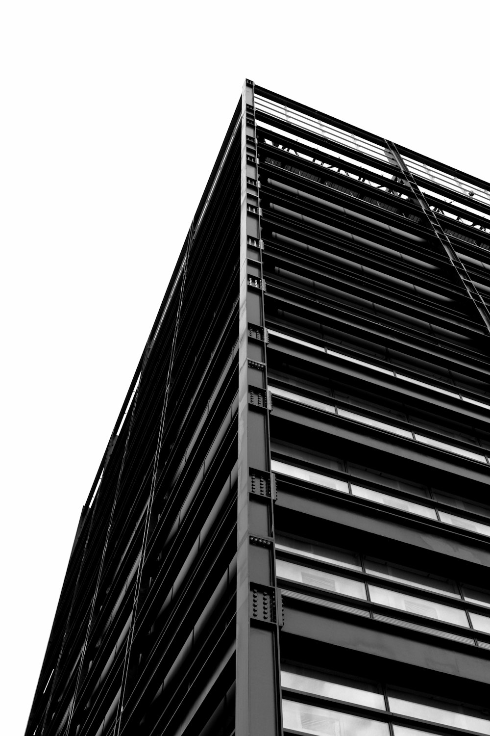 a black and white photo of a tall building