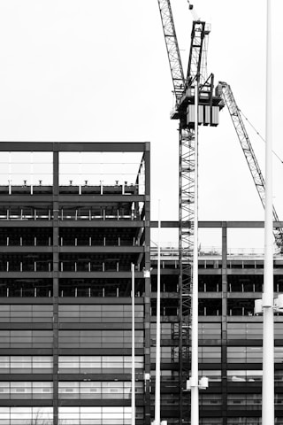 a black and white photo of a construction site