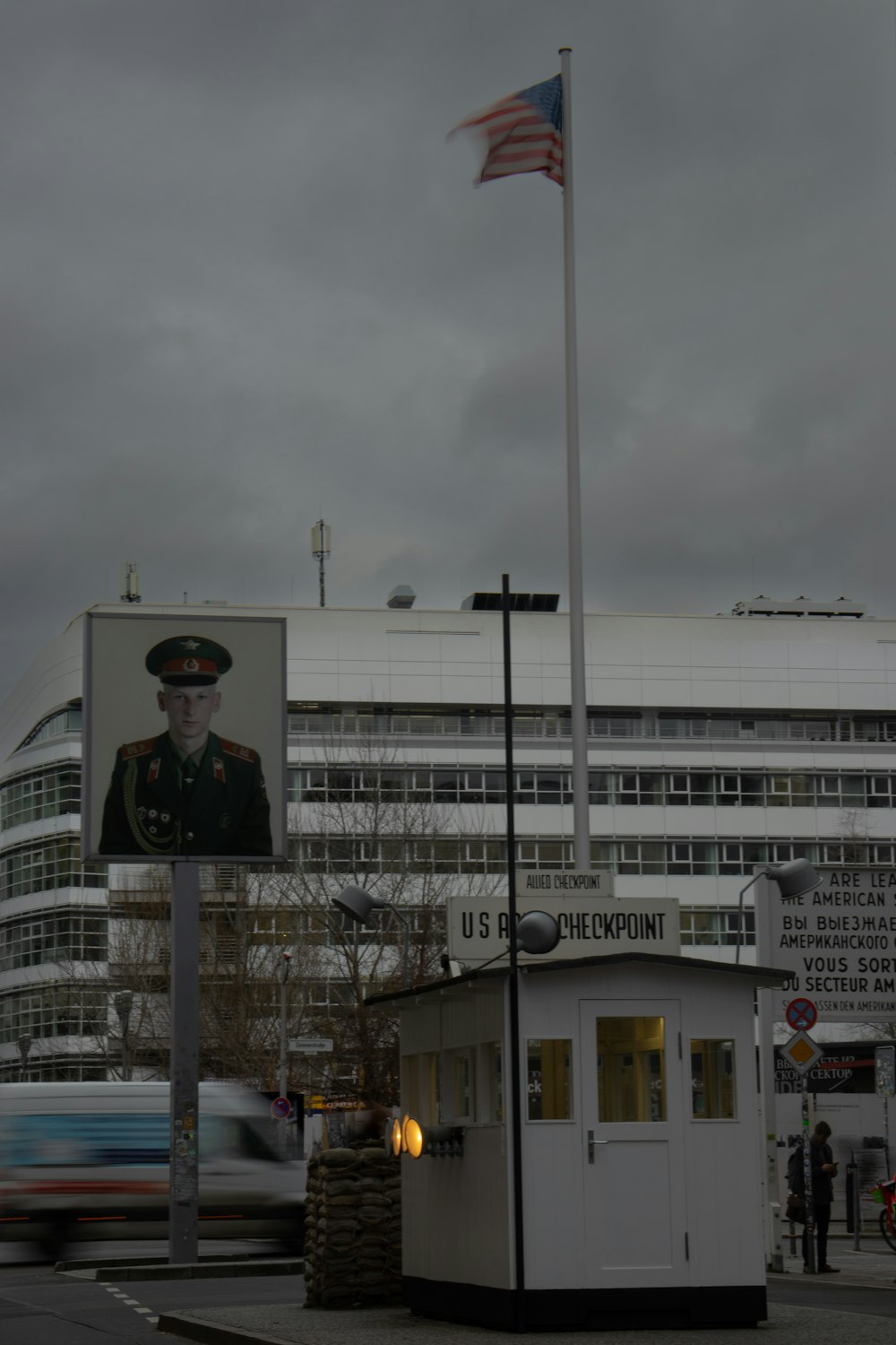 a building with a flag and a picture of a soldier on it