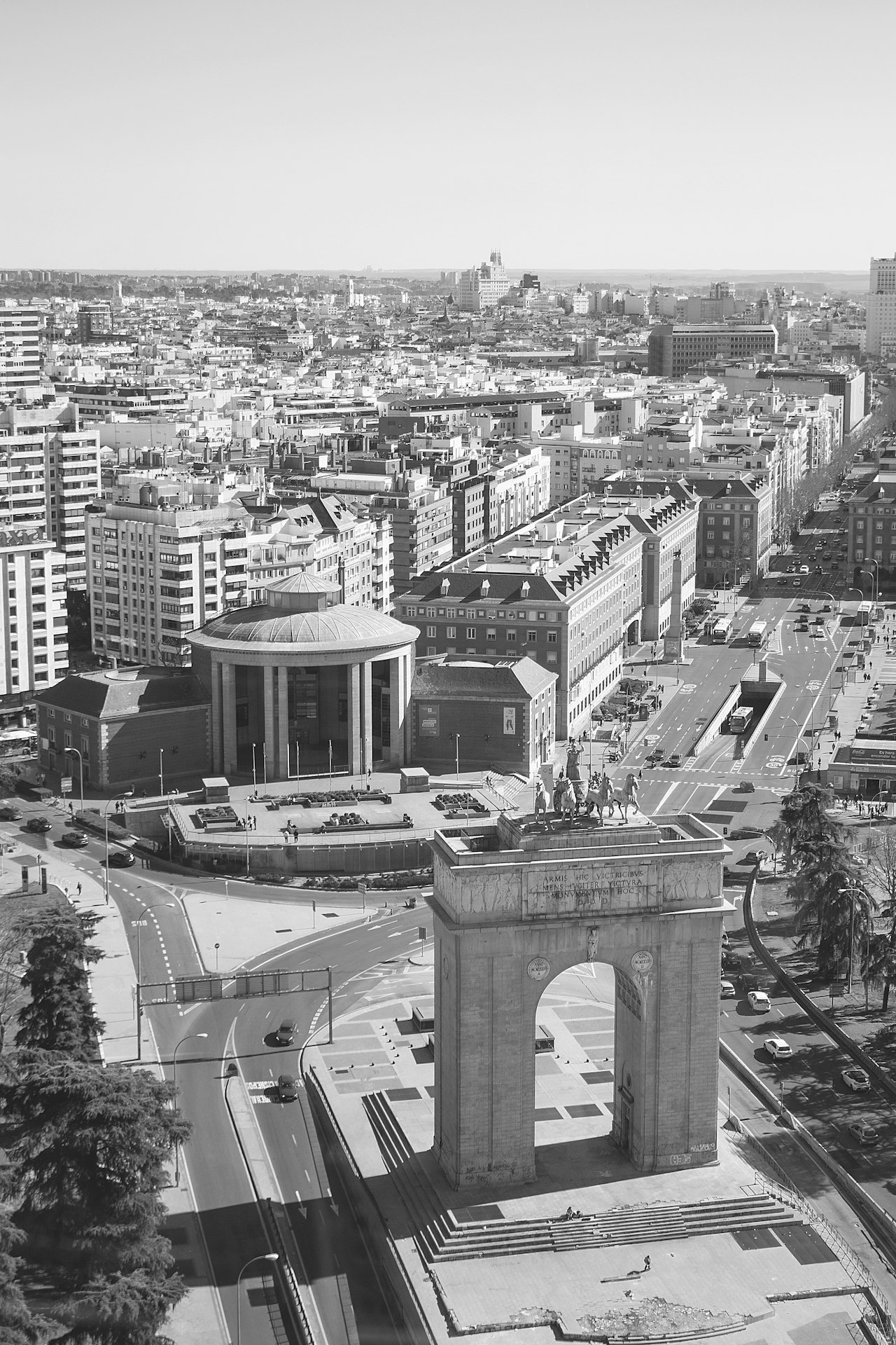 an aerial view of moncloa with a clock tower