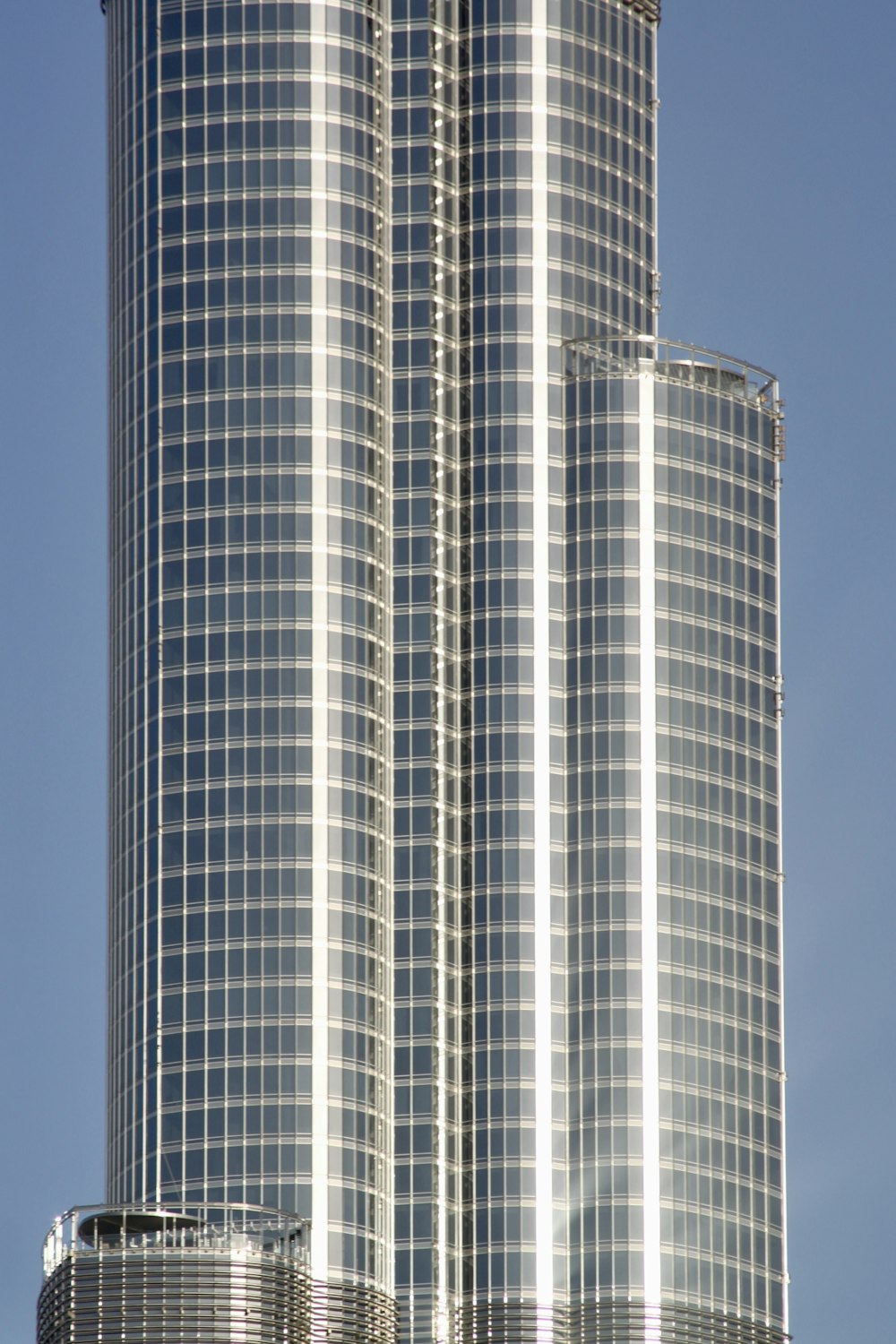 a very tall building with a clock on it's side