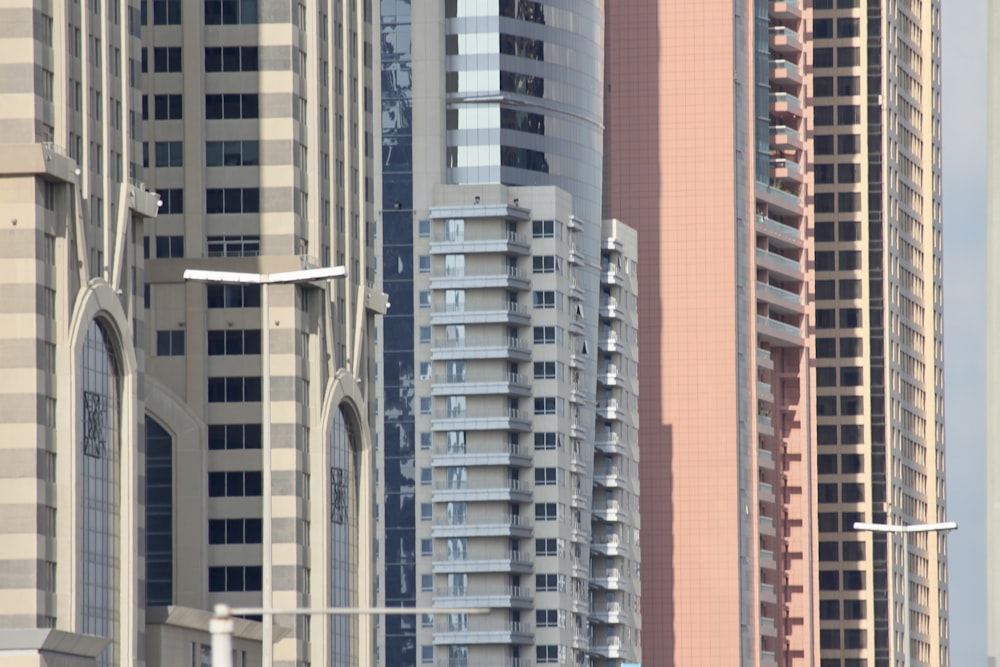 a group of tall buildings in a city