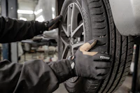 Tire tread on a wheel being fitted