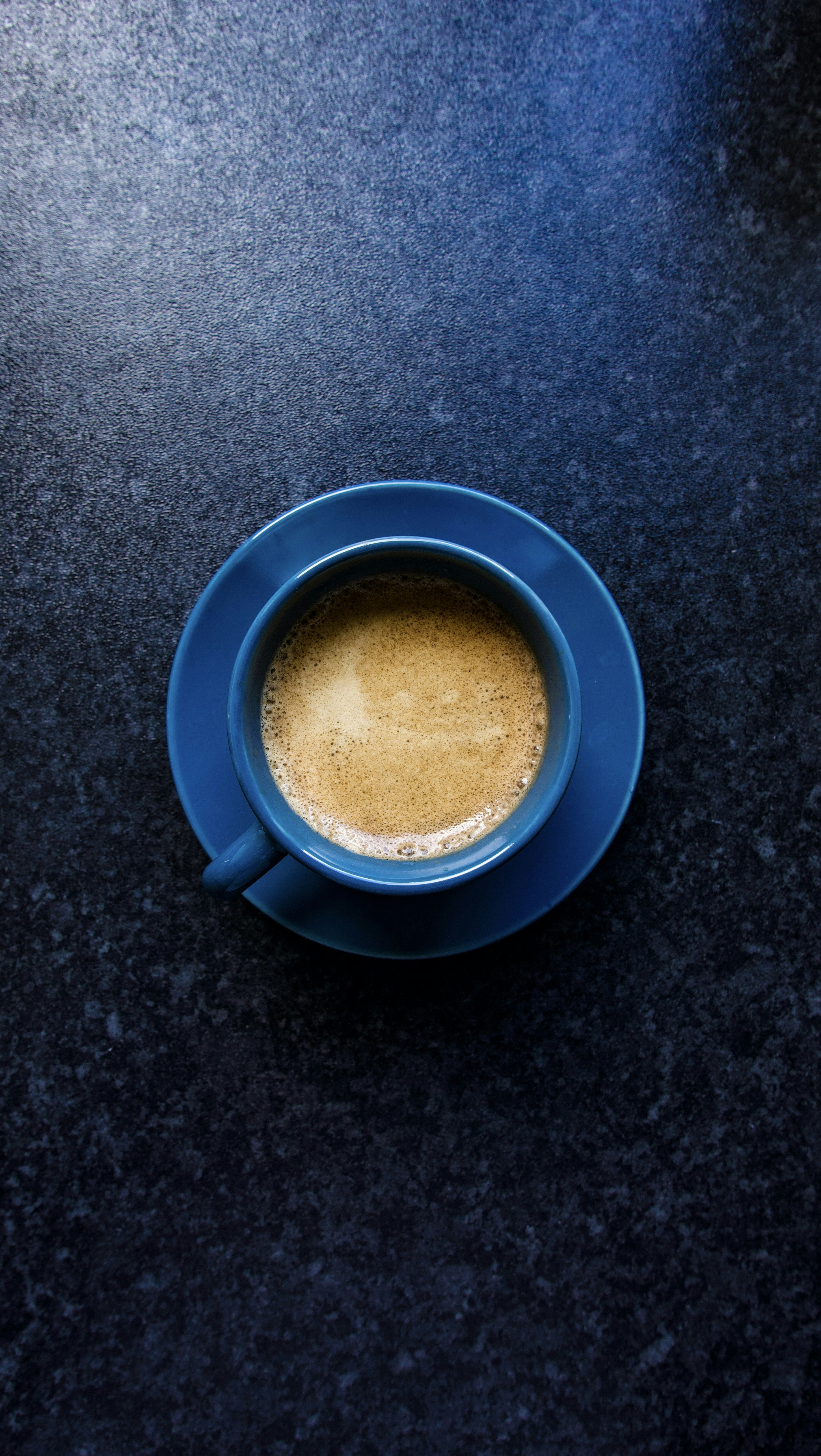 A cup of coffee sitting on top of a table photo – Free Coffee Image on  Unsplash, image size:3000x5322