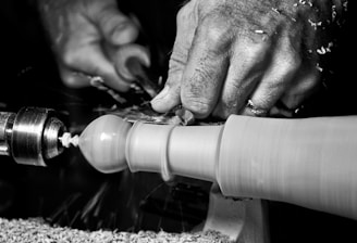 a person working on something with a machine