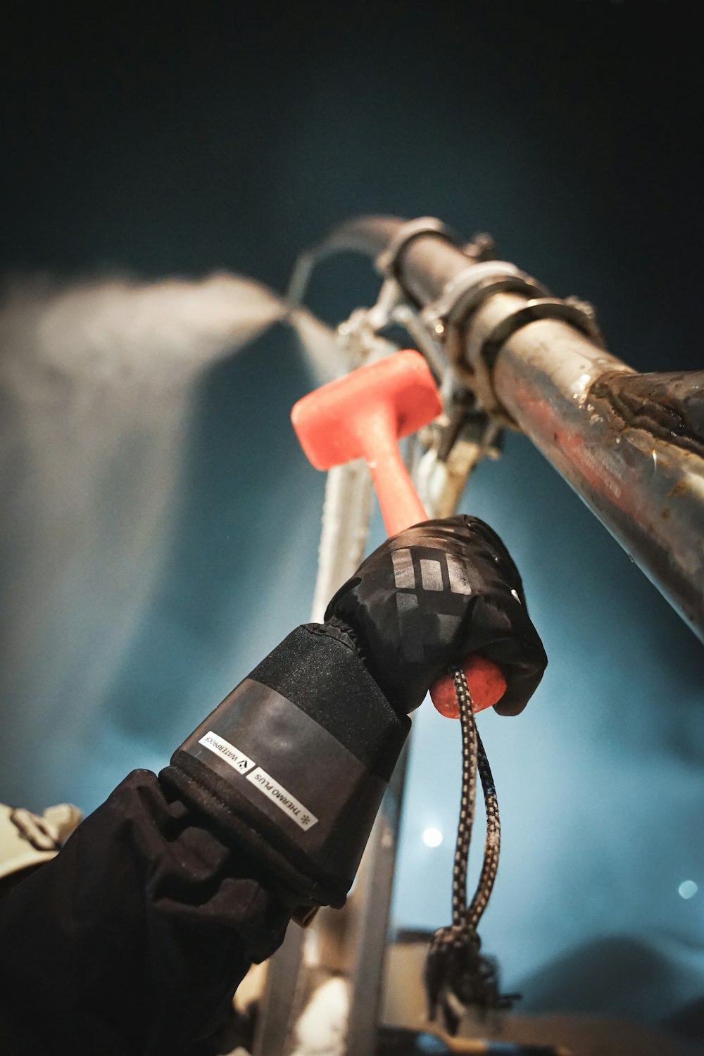 a close up of a person's glove on a bike