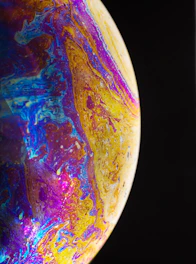 A vibrant cosmic swirl of colors symbolizing joy and human connection.