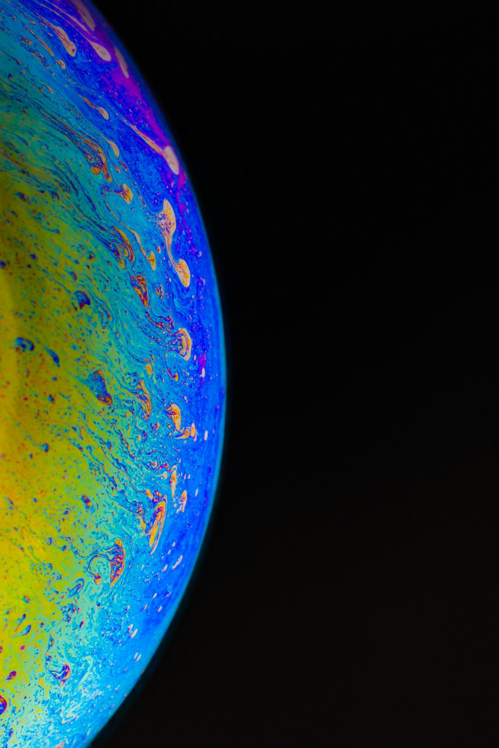 a close up of a blue and yellow object