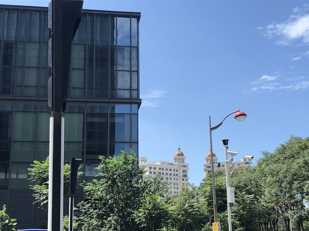 a street light in front of a tall building