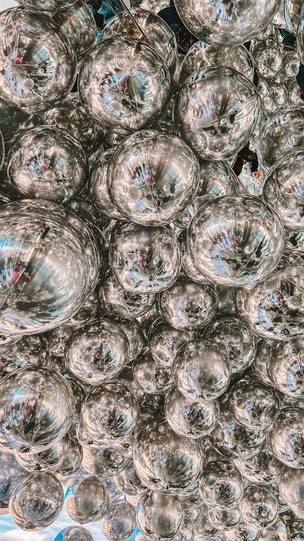 a bunch of glass balls sitting on top of a table