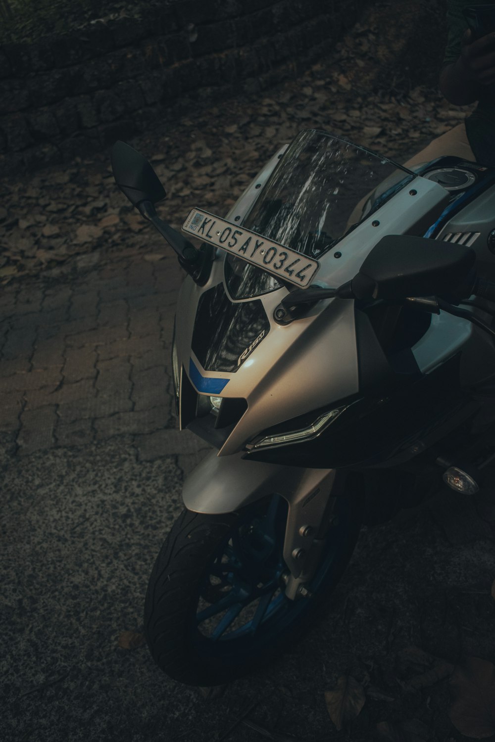 a motorcycle parked on the side of the road