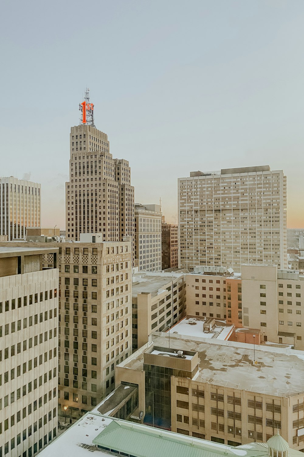 a view of a city with tall buildings