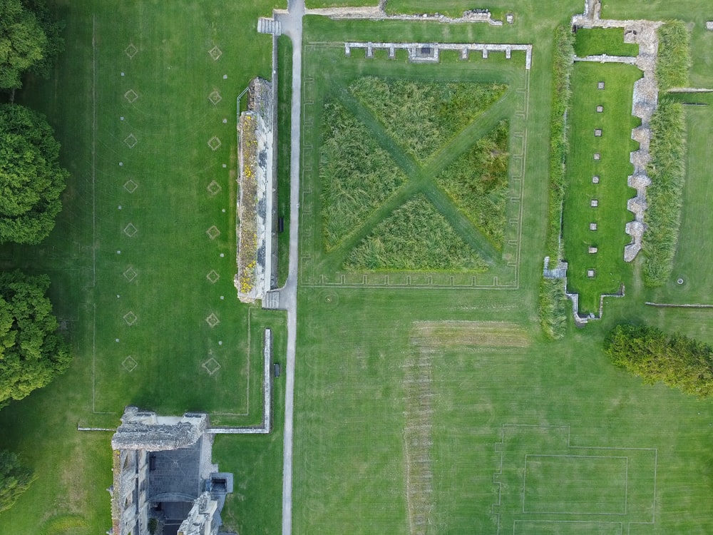 an aerial view of a large grassy field